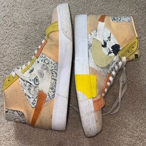 Nike High-Top Sneakers with Yellow and Orange Accents